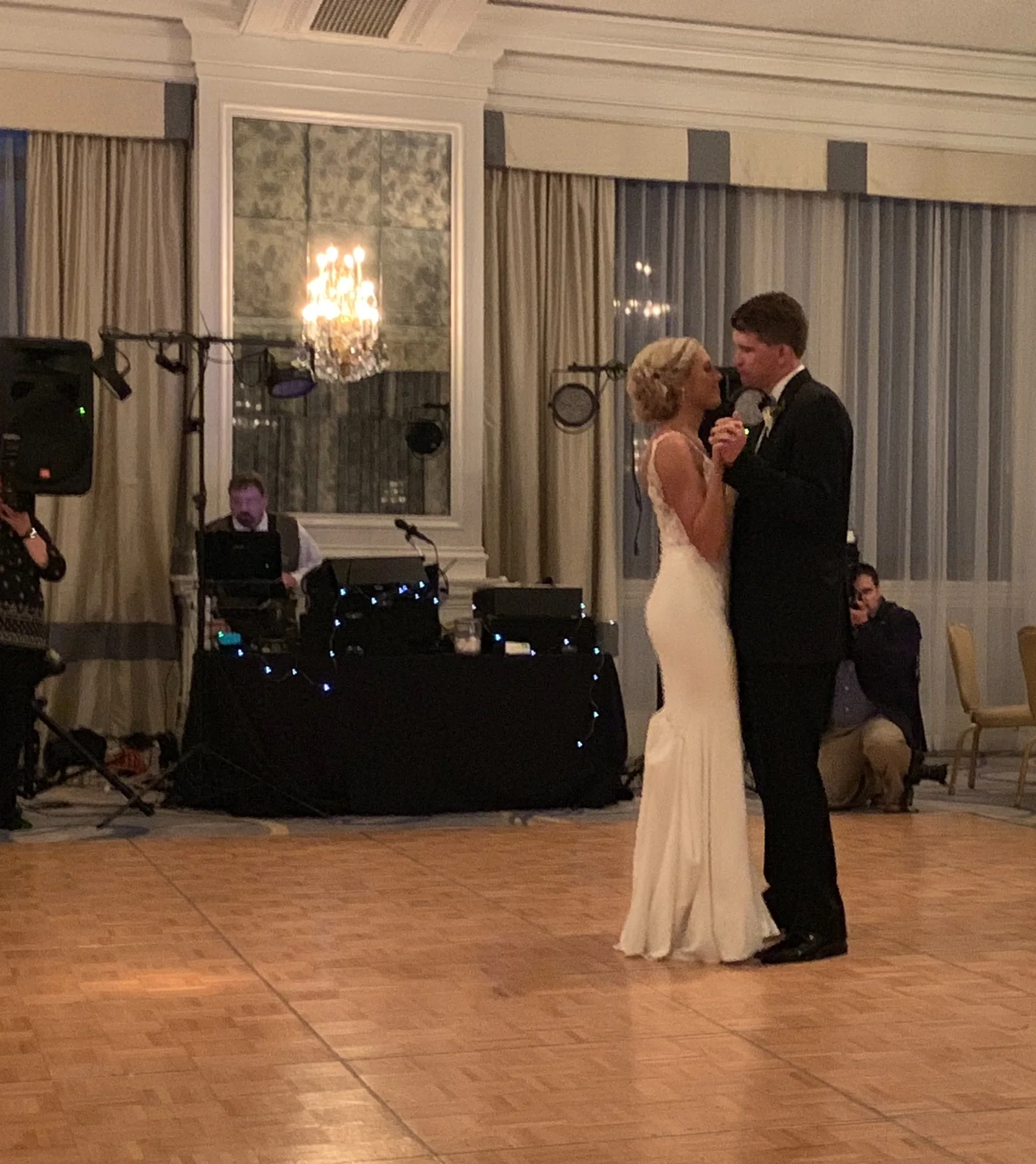 Bride and groom dancing during their wedding reception